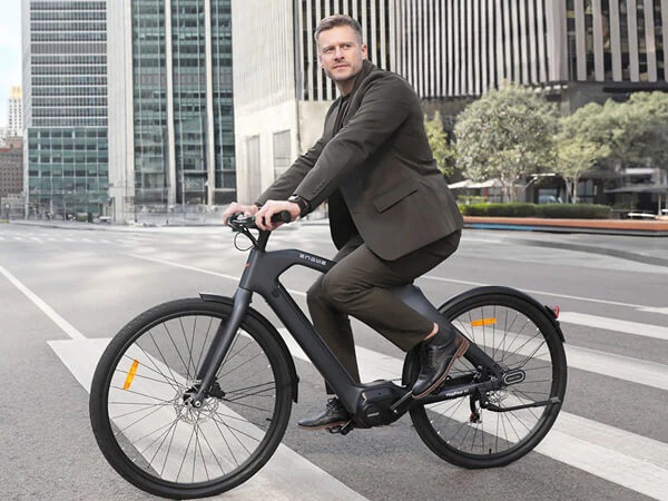 A professional commuter riding a sleek smart e-bike designed for efficient, eco-friendly, and comfortable city transportation.