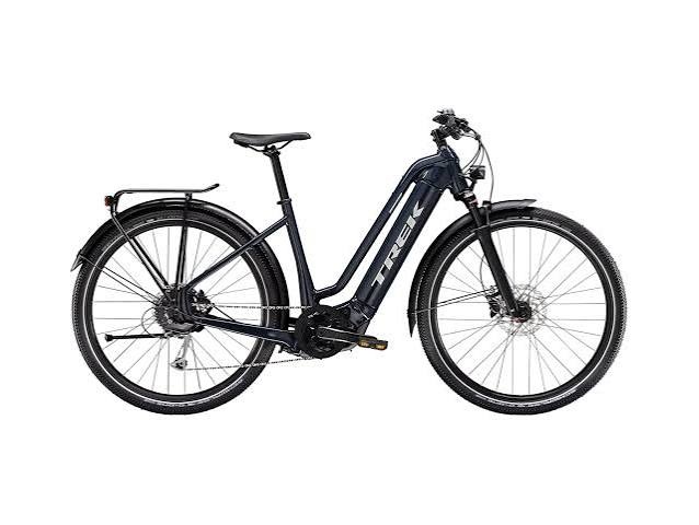 Comfortable step-through electric bike with front suspension, integrated battery, and rear rack for convenient daily commuting.