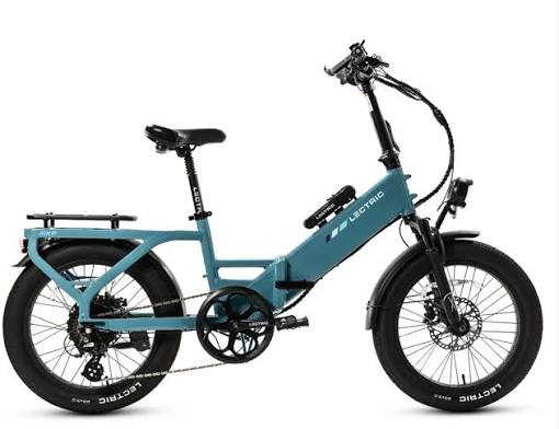 Compact folding electric bike with fat tires, step-through frame, and rear cargo rack for easy storage and versatile city travel.