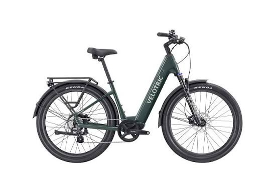 Velotric Discover 2 commuter e-bike with step-through frame, rear rack, and wide tires.